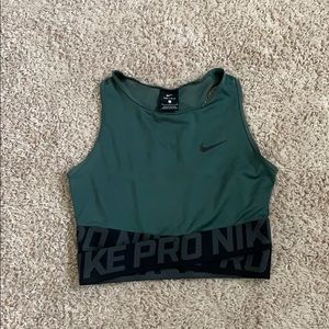 A Nike pro Dri fit crop top in emerald green.